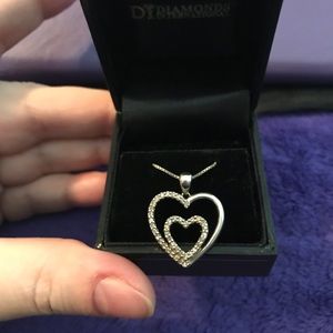 .925 Sterling Silver and Diamond heart pendant